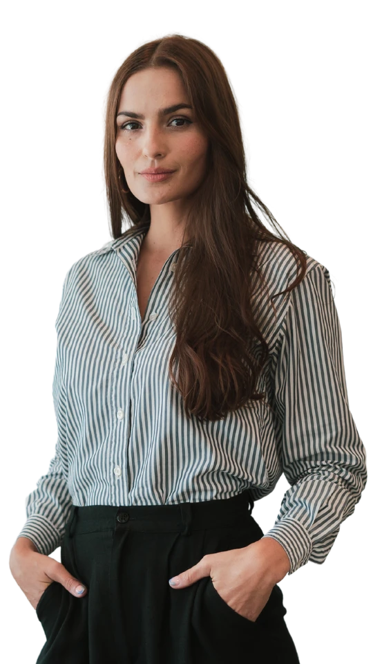 Businesswoman with hands in her pockets